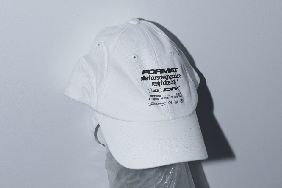 White baseball cap mockup with Format design on display head