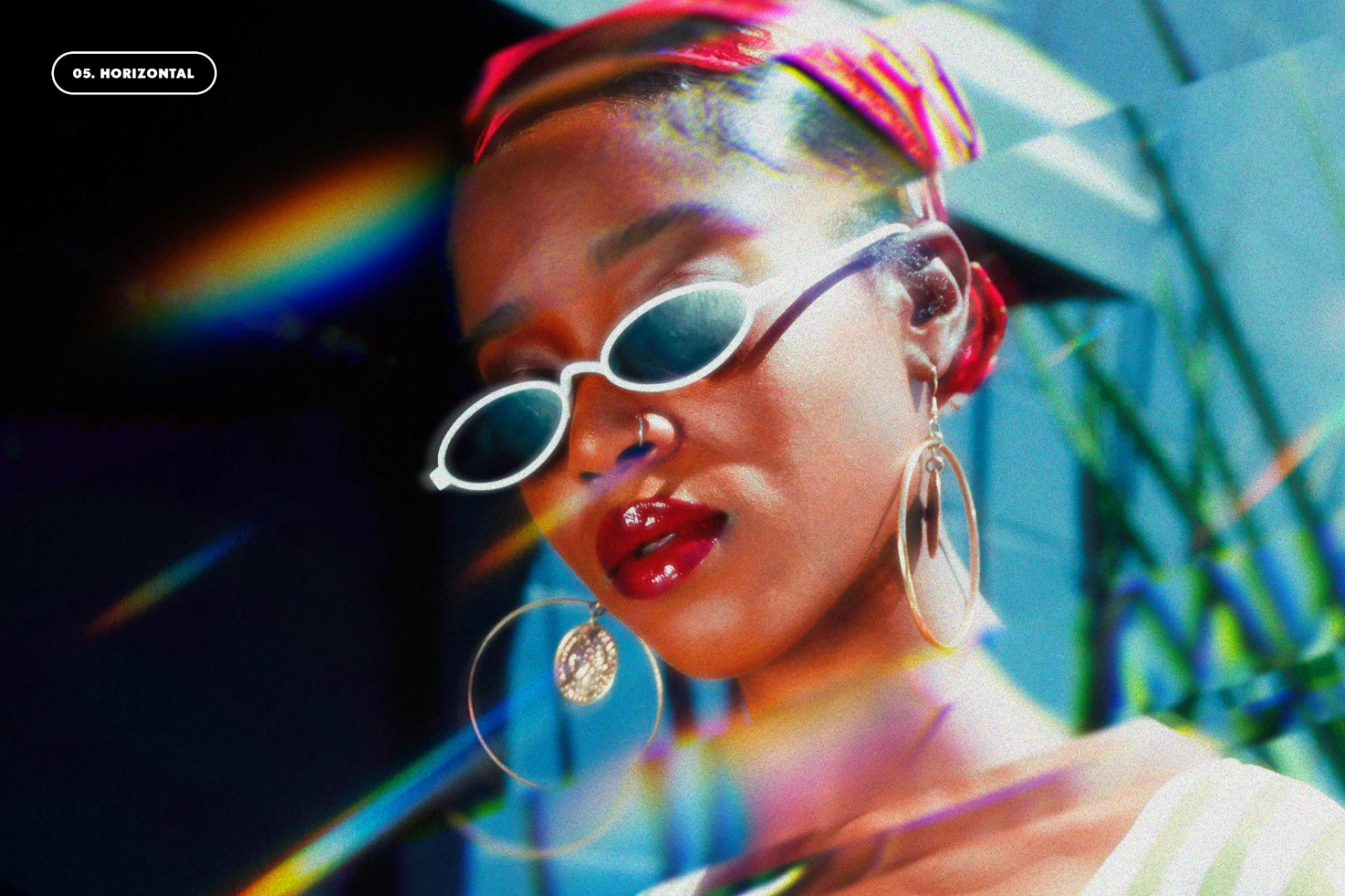 Portrait of woman with sunglasses and large earrings in a colorful light effect background perfect for digital graphics and design resources.