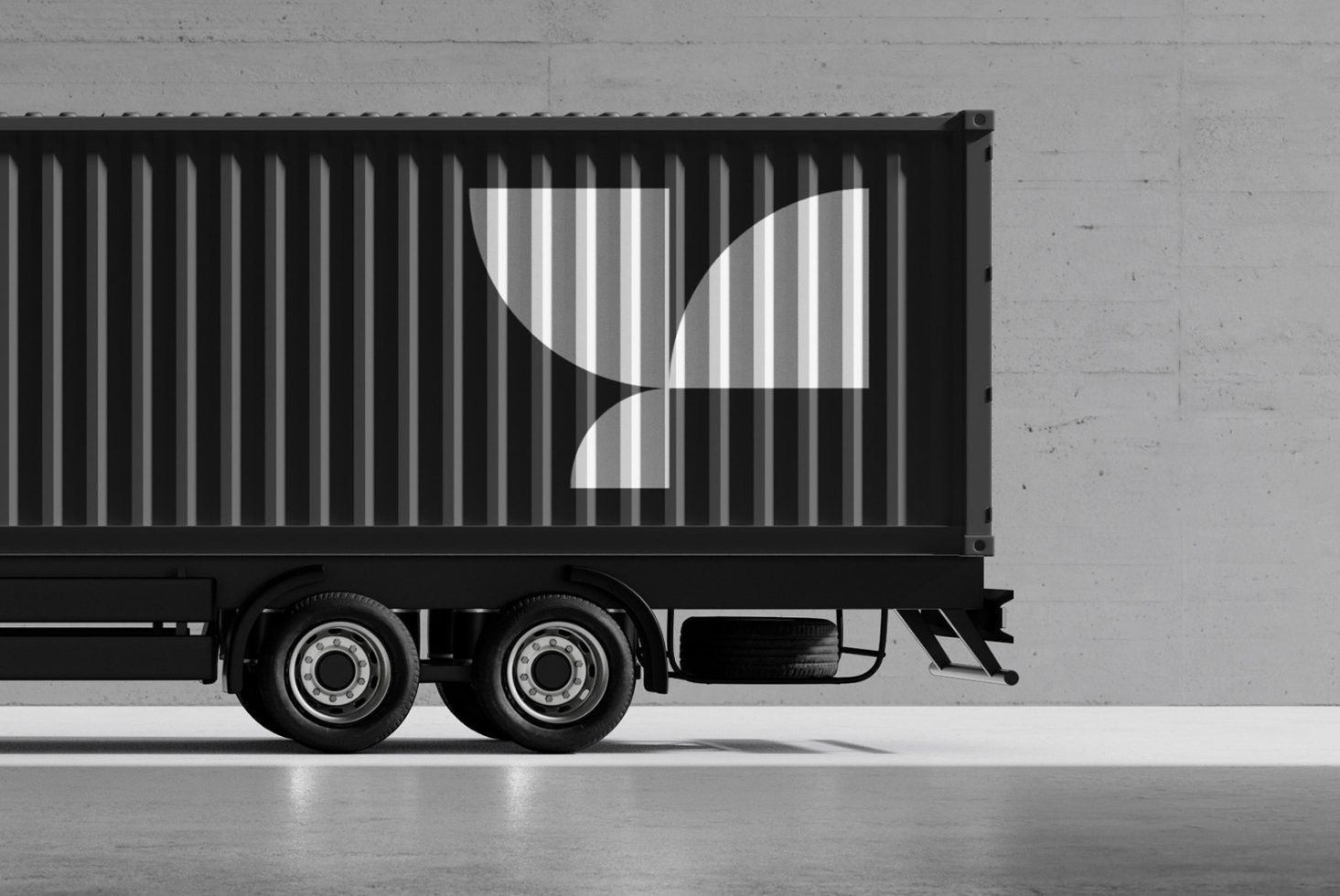 Black cargo truck with minimal geometric logo on container against concrete wall. High-resolution mockup for branding design templates. Industrial graphics.