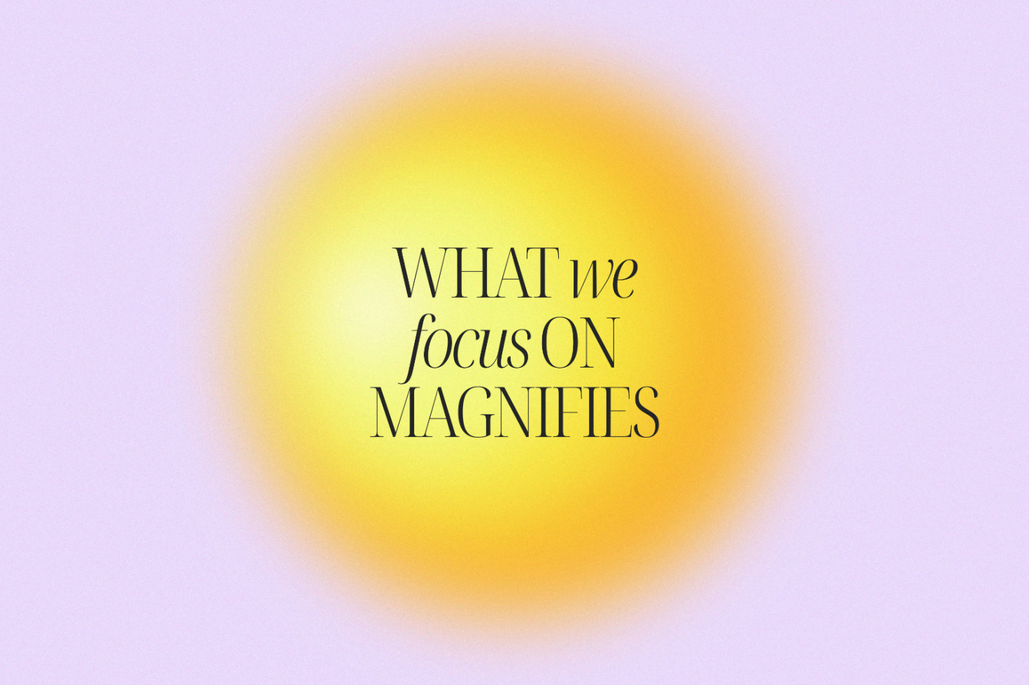 Inspirational quote "What we focus on magnifies" in elegant font over a glowing yellow circle with a soft pink background Motivational graphic template