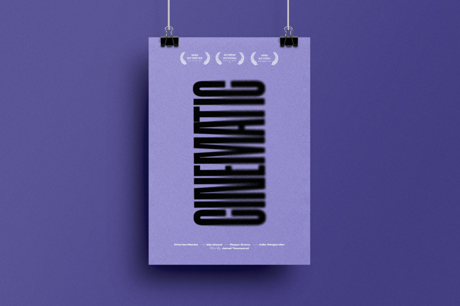 Vertical poster mockup with CINEMATIC text in black blur effect on purple background, clipped on wire. Ideal for showcasing movie posters, graphic design templates.