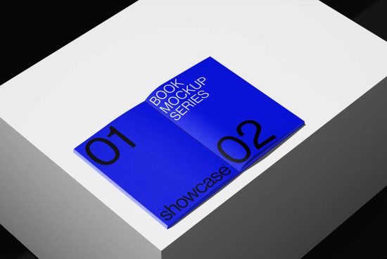 Minimalist book mockup on blue and white background for digital assets. Showcases branding design with pages labeled 01 and 02. Use for design templates.