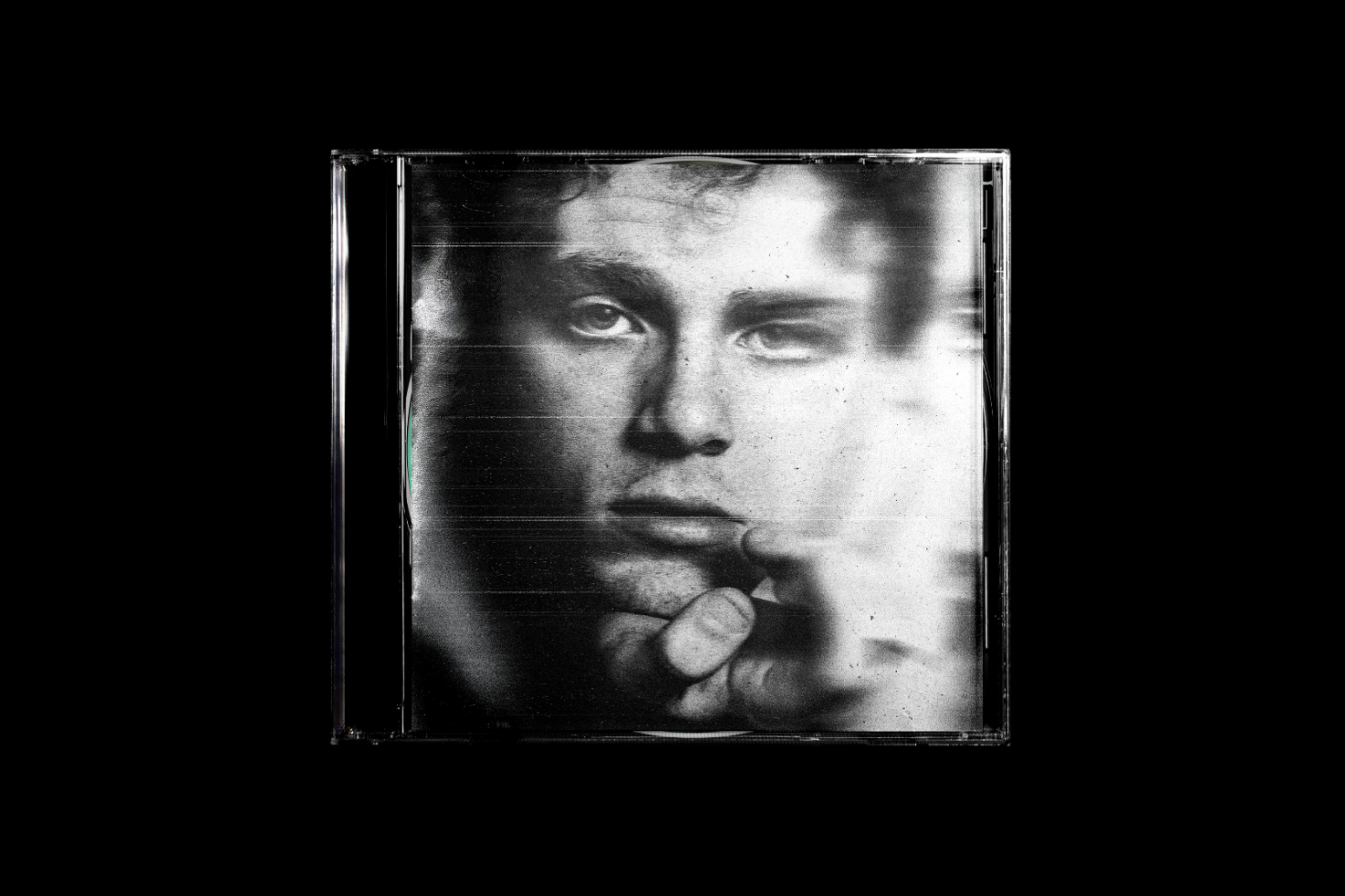 Monochrome distorted portrait of a young man behind a transparent plastic cover suitable for album art mockups digital assets for designers high-resolution graphic.