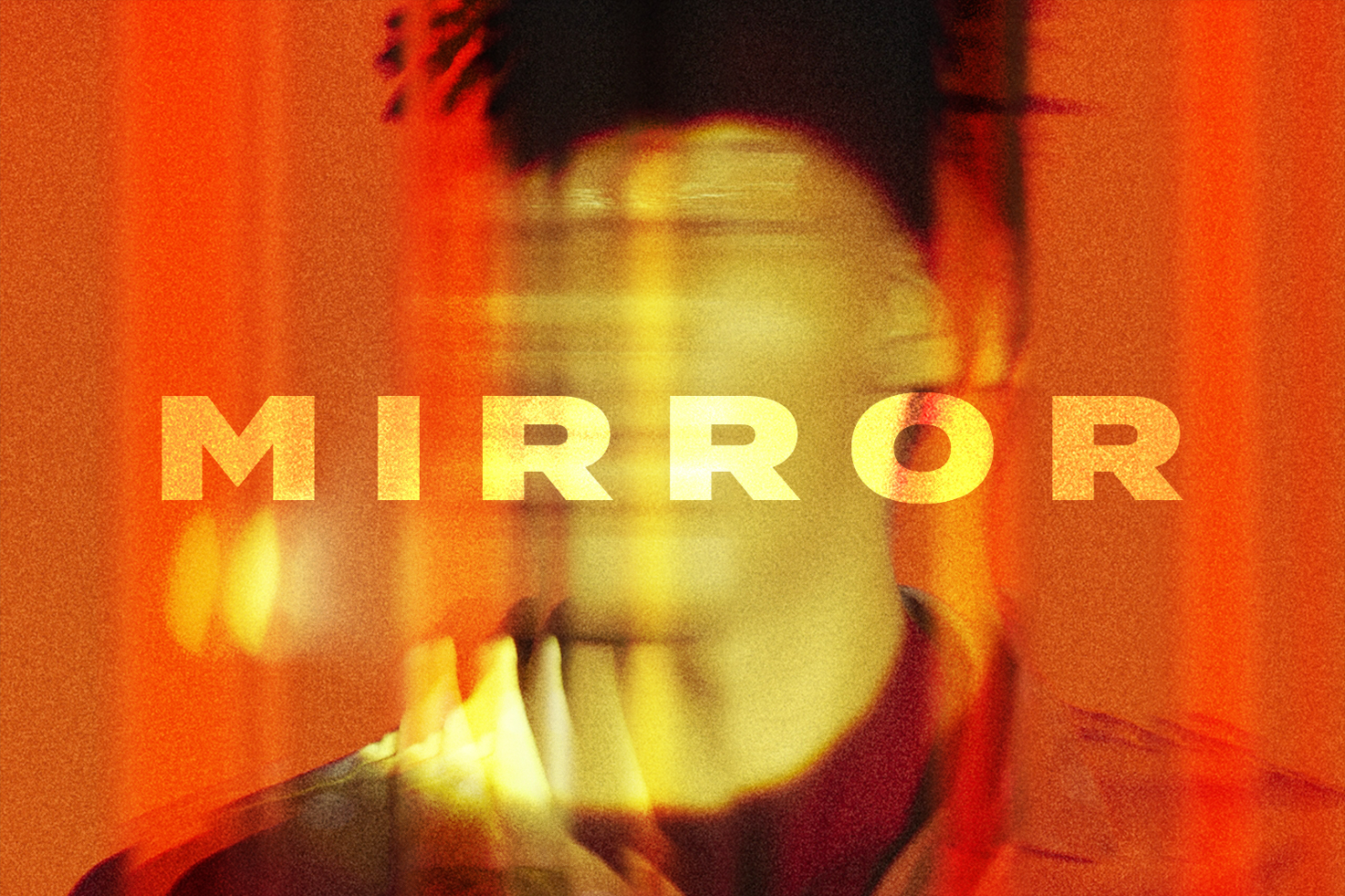 Blurry abstract mirror effect image with neon orange-red tones and bold gold typography saying MIRROR ideal for backgrounds and graphic design projects.