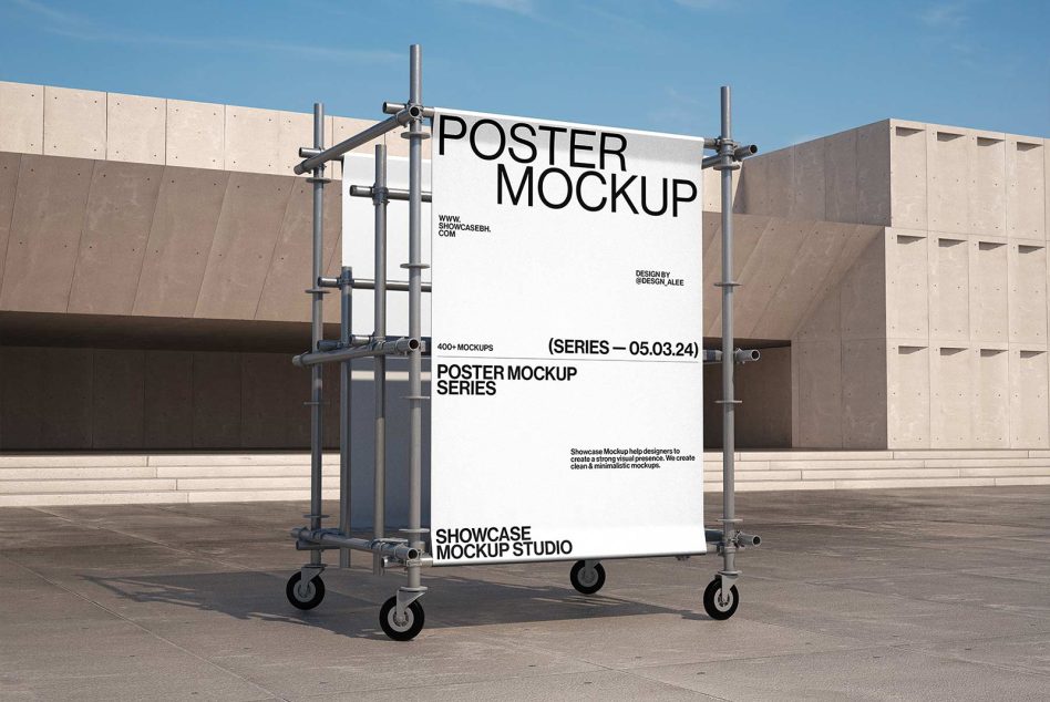 White poster on mobile scaffolding cart with concrete buildings surrounding