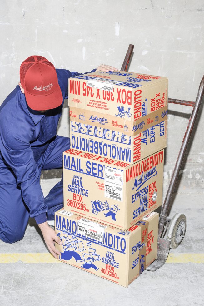 Mockup of a delivery worker unloading boxes with mail service branding on a hand truck, perfect for logistics and shipping themed design projects and graphics.