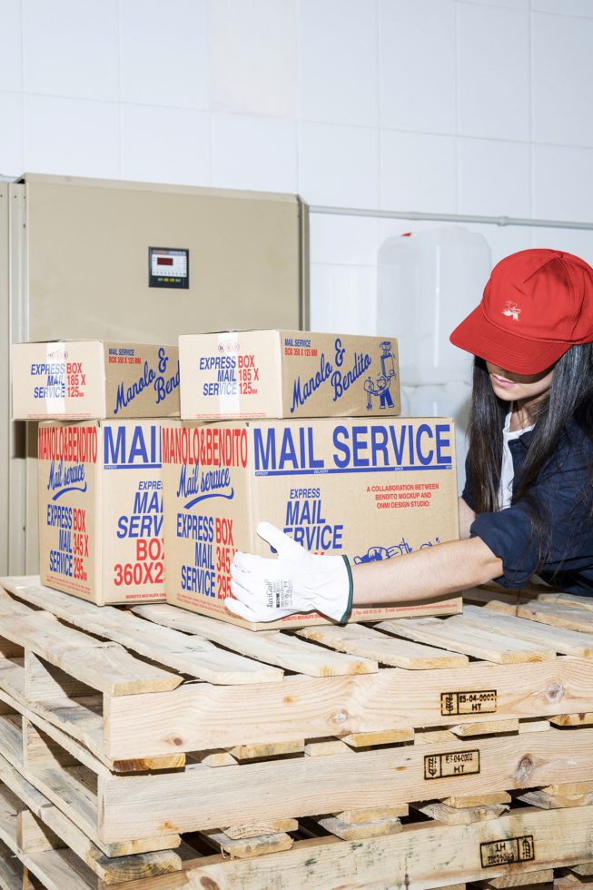 Person stacking cardboard boxes labeled Mail Service on wooden pallets shipping warehouse mockup packaging digital asset for designers logistic graphics