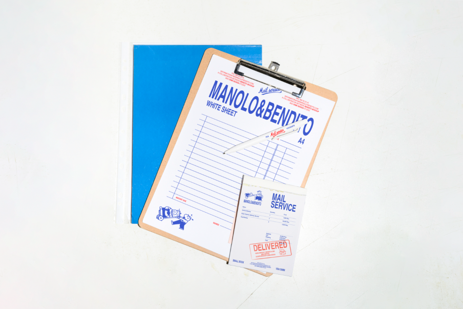 Clipboard mockup with document, pen, and blue folder on white background suitable for designers. Great for office, print materials, and branding presentations.