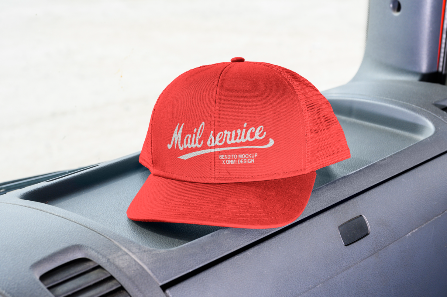 Red trucker cap mockup with Mail Service logo on dashboard, ideal for showcasing branding designs; suitable for product mockups and graphic design projects.