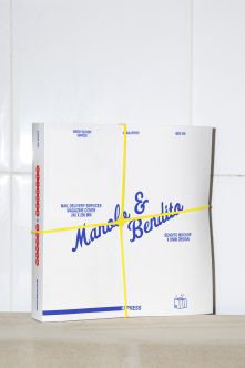 Blue version of magazine cover mockup with yellow tape wrapped around spine