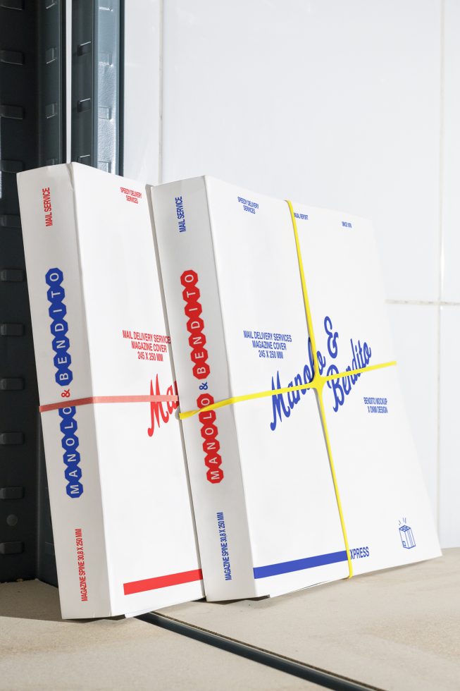 Magazine cover design mockup displaying three white envelopes with vibrant red and blue branding, wrapped with rubber bands. Perfect for design presentations.