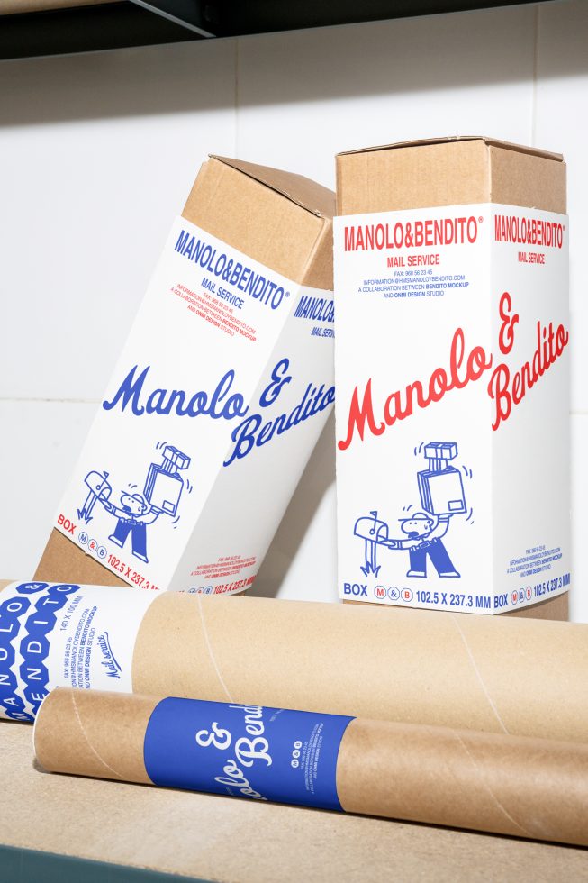 Shipping box mockup featuring Manolo and Bendito branding. Ideal for showcasing packaging designs. Keywords: mockup, packaging, box, shipping, design, branding