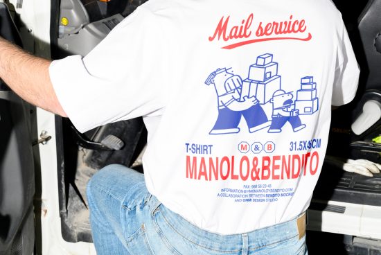 Person in jeans and white graphic t-shirt promoting mail service Manolo&Bendito holding boxes. Ideal for template designers creating custom apparel graphics.