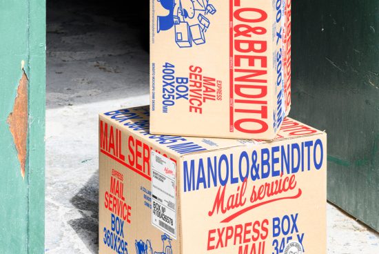 Mockup of two cardboard boxes with Manolo & Bendito Mail Service branding in red and blue colors placed outdoors against a green door background.