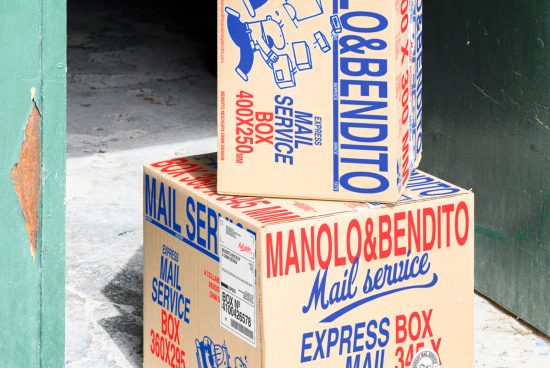 Two cardboard boxes labeled MANOLO & BENDITO Mail Service, one on top of the other, ideal for packaging mockups, templates, or graphics for designers.