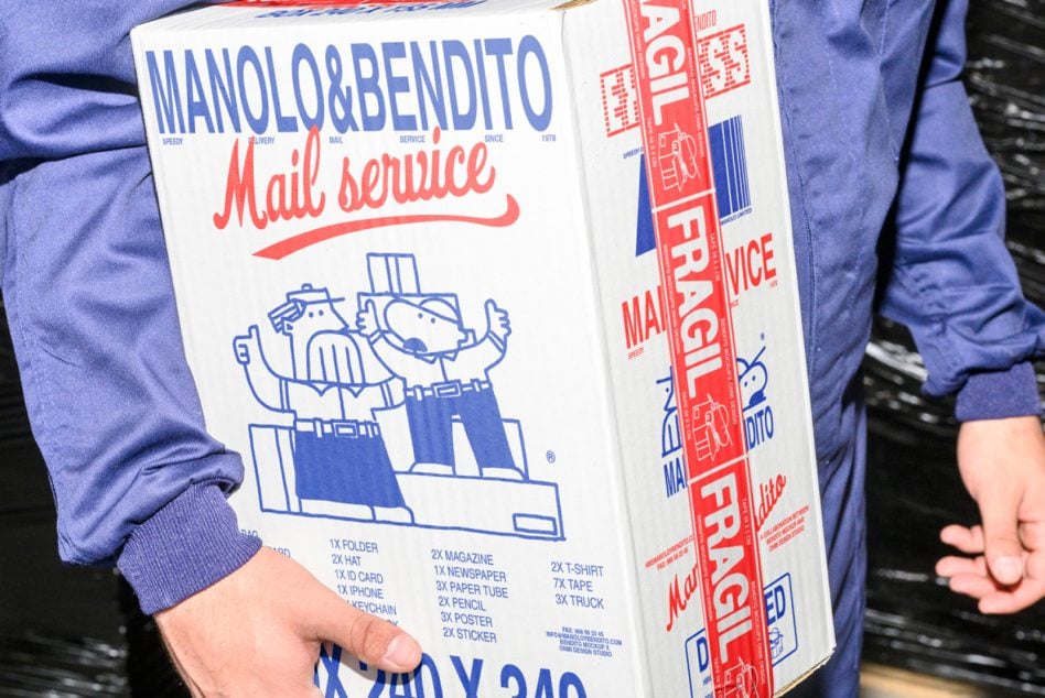 Manolo Bendito mail service box mockup with red cartoon character delivering mail