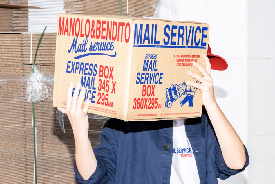 Person holding oversized mail service box with red cap, head completely covered