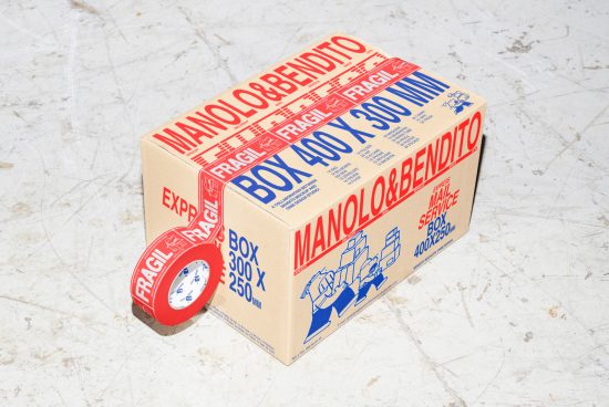Packaging mockup featuring a cardboard box and roll of red Fragile tape suitable for designers. Keywords: mockup, packaging, design, graphic, template.