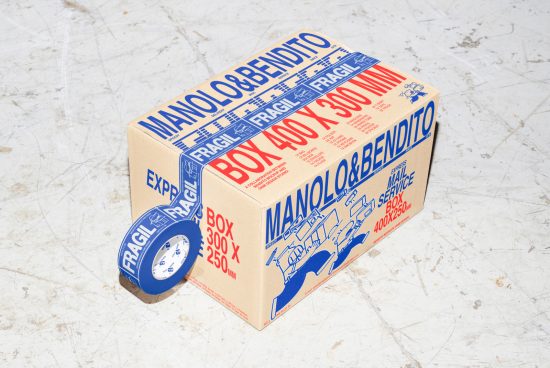 Cardboard box and tape mockup with bold red, blue typography fragile labels, textured concrete background. Ideal for packaging design projects, graphic design assets.