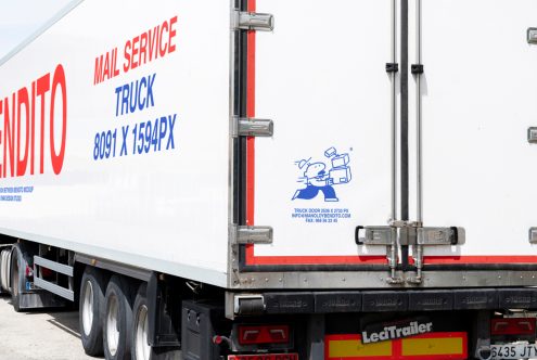 Mockup of a white mail service truck with text of dimensions 8091X1594PX on side, ideal for showcasing design templates or vehicle branding for designers.