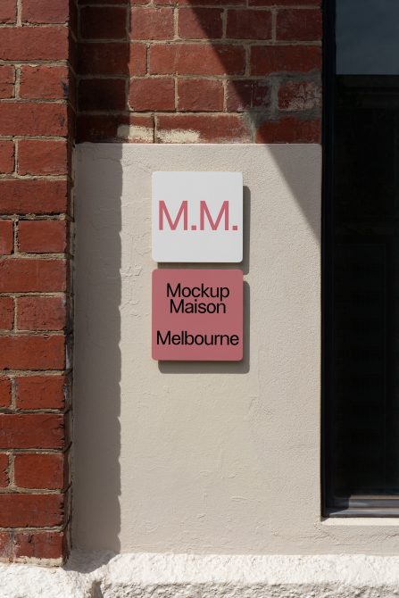 Vertical sign mockup on a brick wall for Mockup Maison Melbourne. Suitable for showcasing branding and design templates. Perfect for designers and marketers.