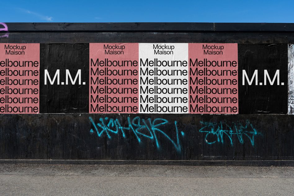 Storefront window with pink, black, white panels showing repeated Melbourne text layout