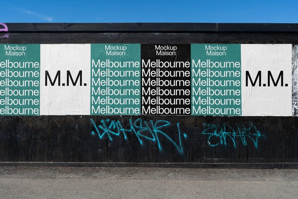Storefront window display with teal, black, white panels showing repeated Melbourne text