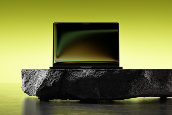 Laptop mockup on rough stone slab with yellow background. Suitable for showcasing digital assets. Keywords: laptop, mockup, digital design, background.