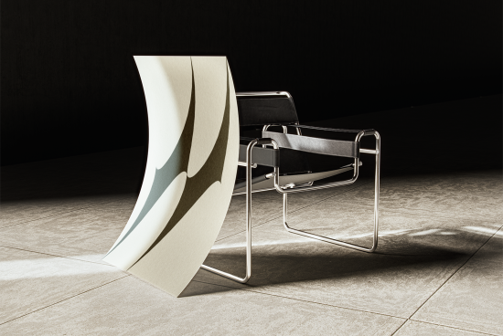 Modern chair with metal frame and leather seating next to a large curved abstract poster display in a minimalistic dim-lit environment ideal for mockup designs