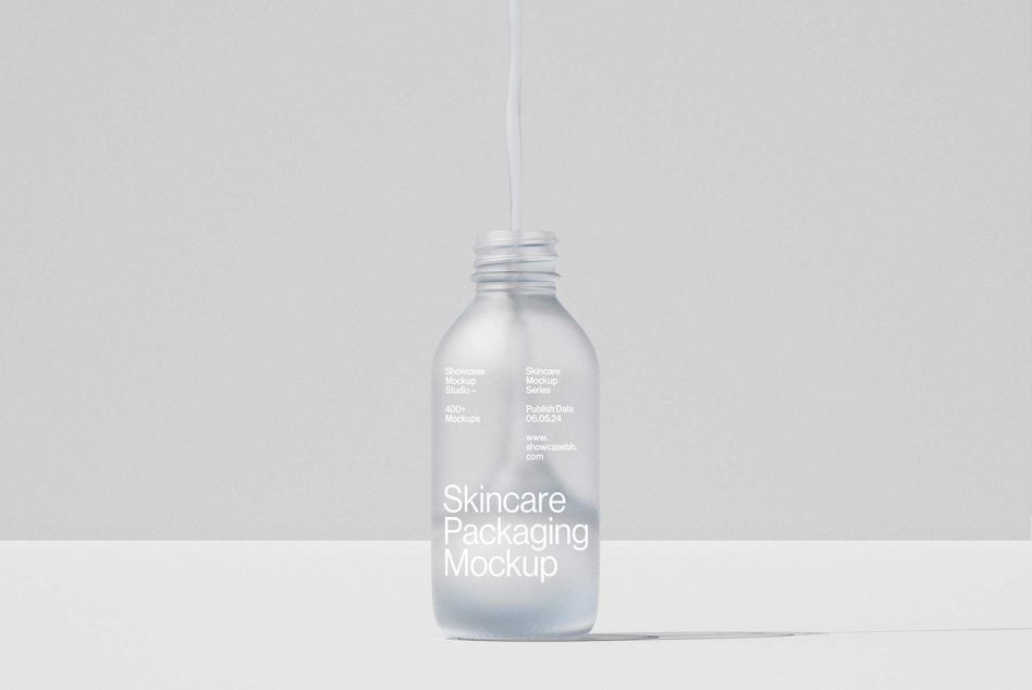 Skincare packaging mockup bottle in minimalistic design, ideal for showcasing cosmetic brand templates, graphics packaging, and product presentations.