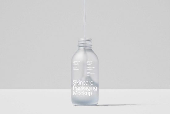 Clear glass skincare bottle mockup for designers with modern minimalist design. Suitable for skincare product packaging, label design, and branding mockups.