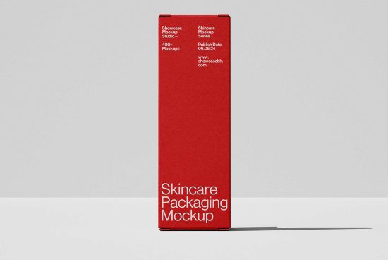 Red skincare packaging mockup standing on a white surface, showcasing modern minimalist design. Perfect for skincare product presentations and branding.