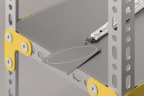 Gray tablet on pegboard shelf with yellow storage clips plus fabric keychain
