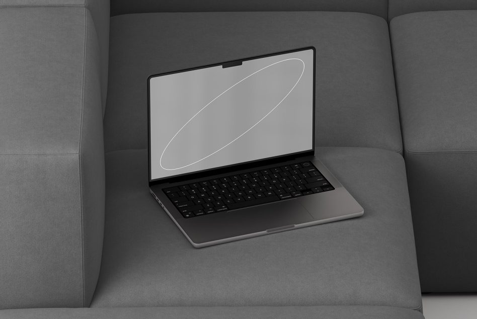 Laptop Mockup showcasing a sleek black laptop placed on a grey couch perfect for showcasing website designs UI UX templates digital graphics for designers