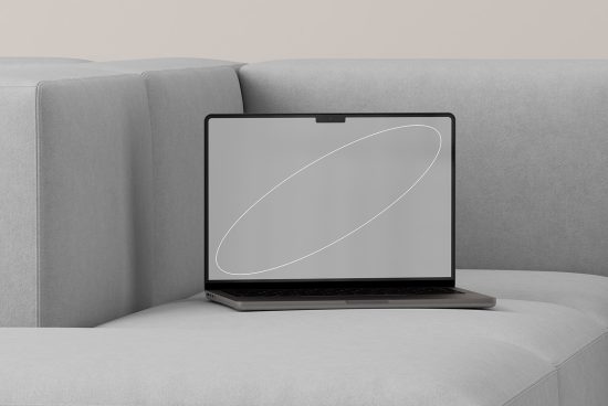 Laptop mockup on gray couch design designers digital assets templates graphics mock-up display minimalist modern workspace SEO visual design tools creative