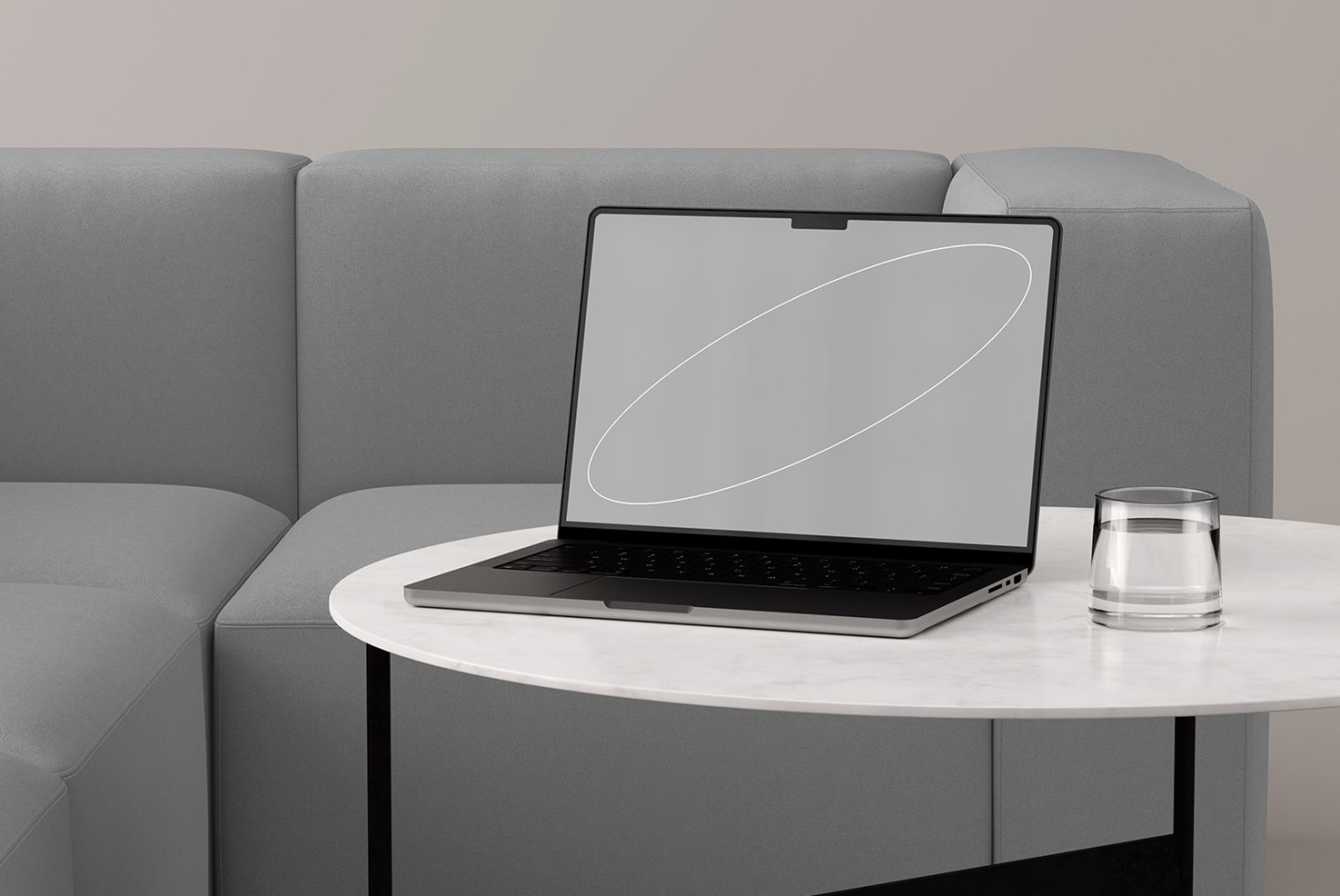 Laptop mockup on white marble table by gray couch with blank screen and a glass of water, ideal for designers. Categories: Mockups, Design, Digital assets.