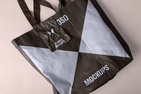 Reusable tote bag mockup with modern geometric design in gray and brown colors suitable for showcasing branding graphics and design templates.