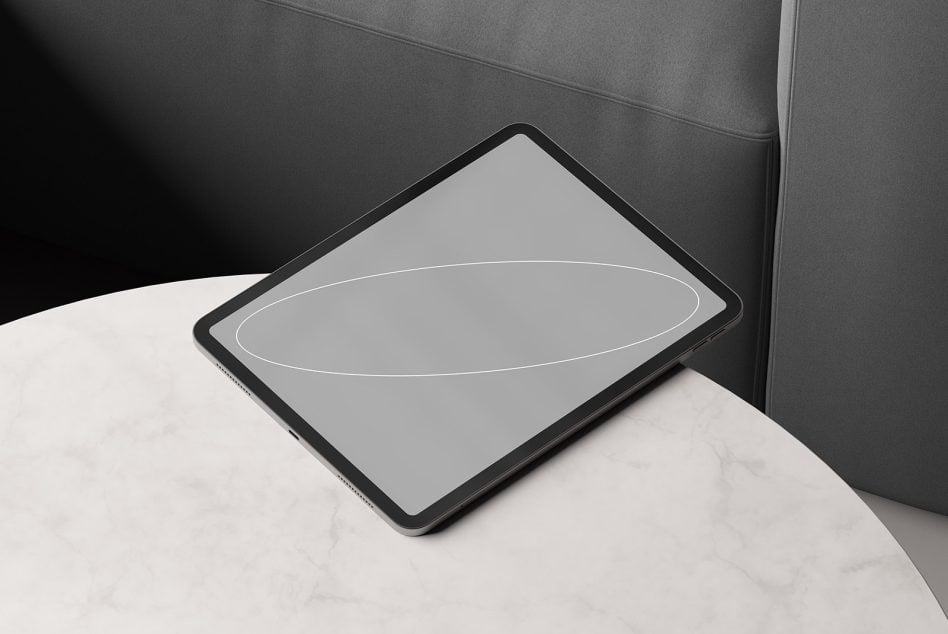 Tablet mockup on marble with neutral gray screen, minimalist line illustration
