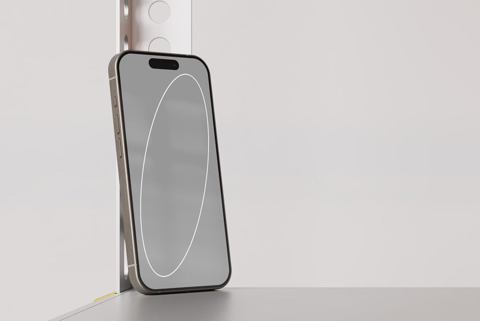 Phone in corner displaying simple white curved line on solid gray background