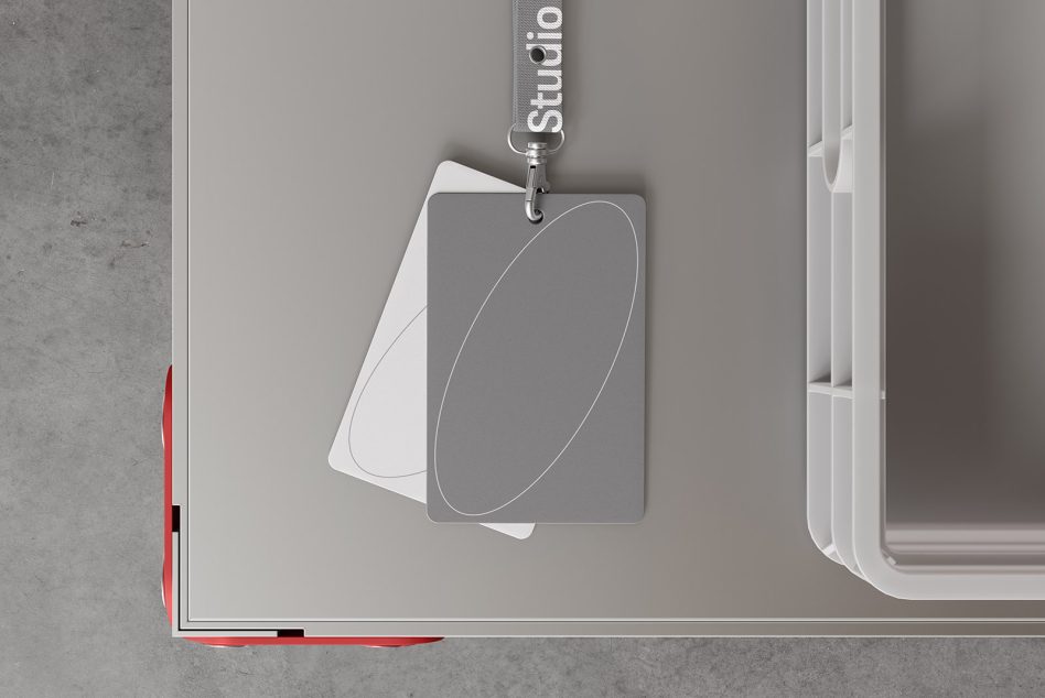 Lanyard badge mockup template for designers top view gray and white cards minimalist design on a desk perfect for event pass or ID card presentation