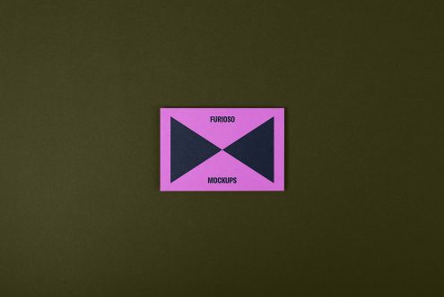 Business card mockup on olive green background, featuring a minimalist design with pink edges and dark center. Ideal for graphic designers and template creators.