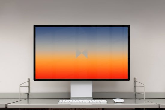 Minimalist computer mockup on a modern desk with a vibrant gradient screen background ideal for digital assets for graphic designers and professionals.