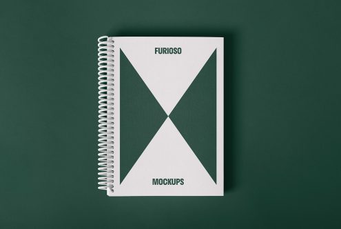 Spiral-bound notebook mockup with minimalist design on green background suitable for designers digital assets marketplace templates mockups graphics.