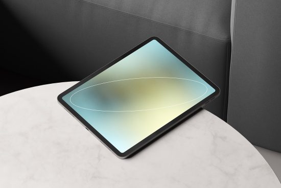 Tablet on a marble table with blank screen for mockup. Suitable for UI/UX design presentation, responsive website showcase, or digital product advertisements.