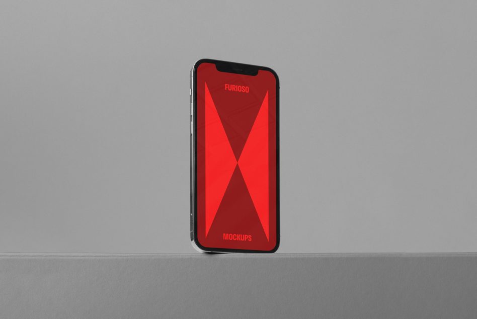 Minimalistic smartphone mockup with a red screen displayed against a gray background, ideal for showcasing apps or designs. Keywords: mockup smartphone red minimalist design.