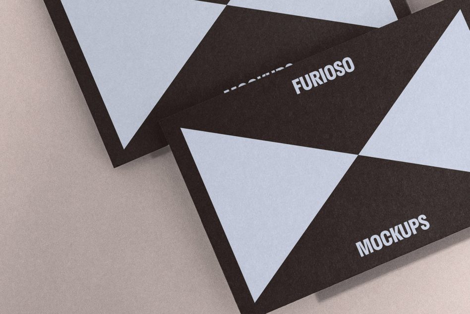 Elegant business card mockup with a minimalist black and light gray geometric design, perfect for showcasing branding and stationery designs for designers.