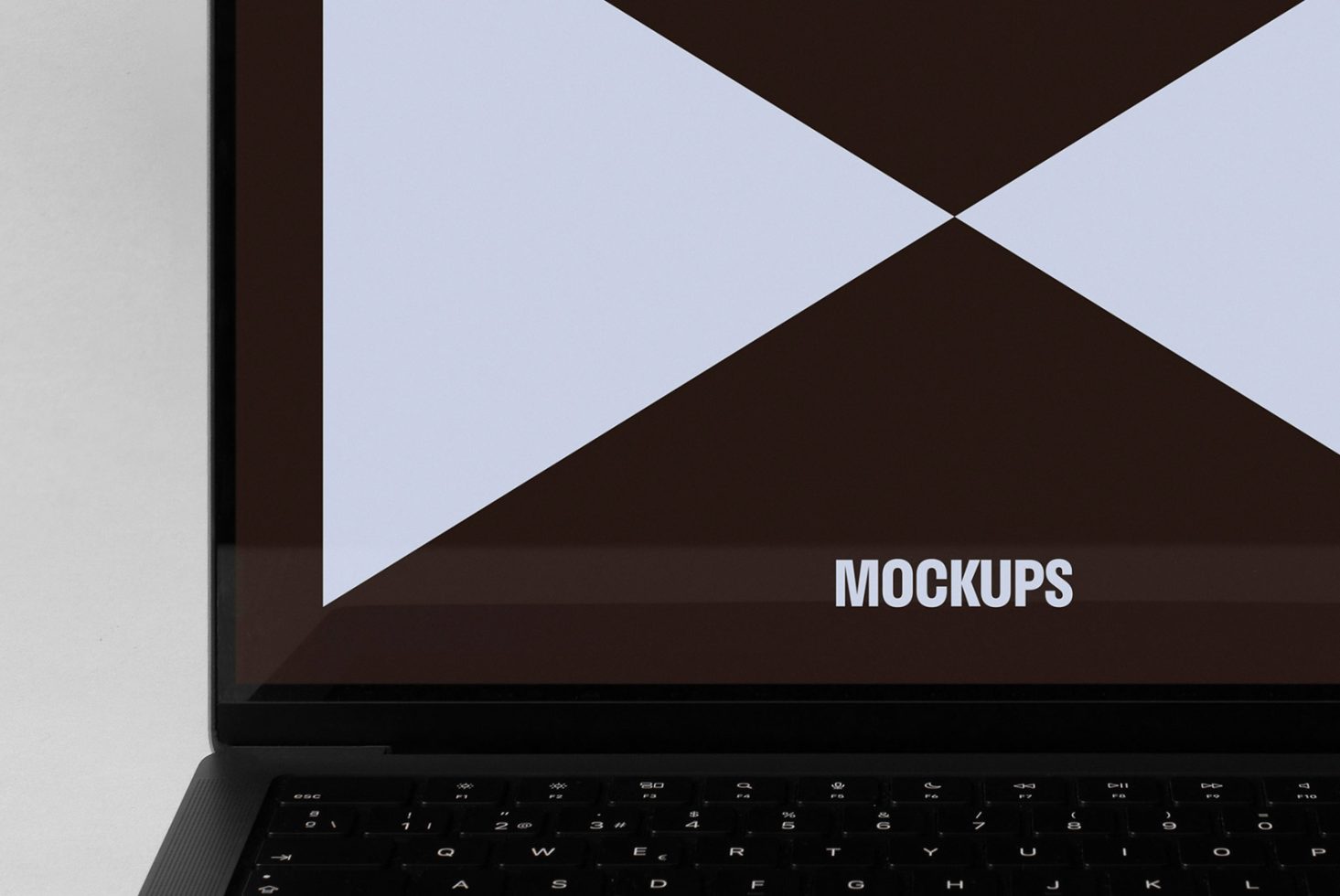 Mockup of a laptop screen displaying a geometric pattern emphasizing clean design lines suitable for graphic designers and UI/UX professionals.