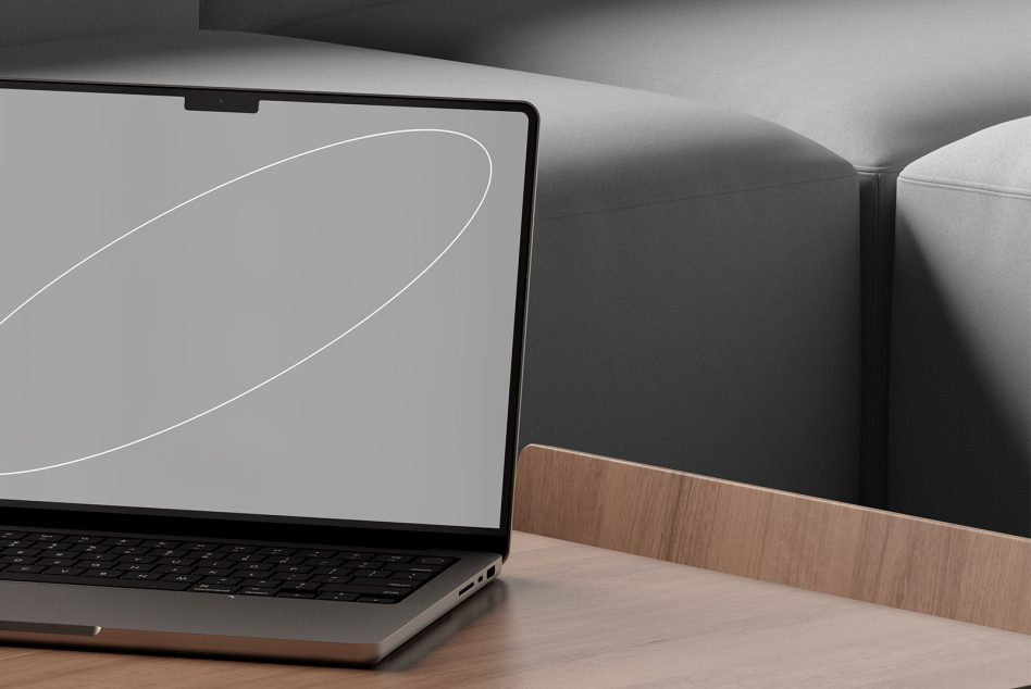 Close up of laptop screen showing minimalist white curve design on gray