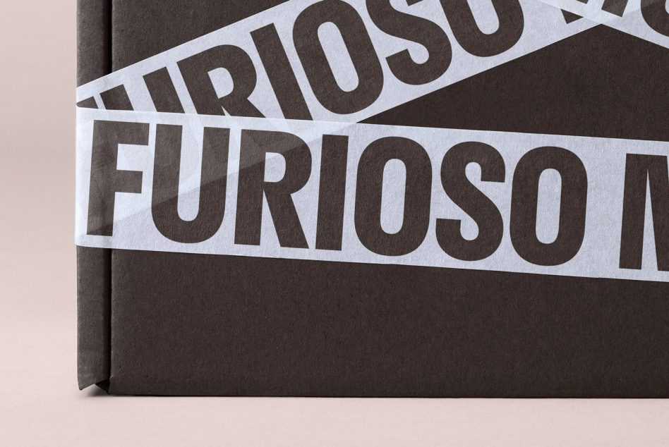 Black box with white textured tape featuring the word Furioso in bold letters across the wrapping perfect for packaging design mockups and graphic templates.