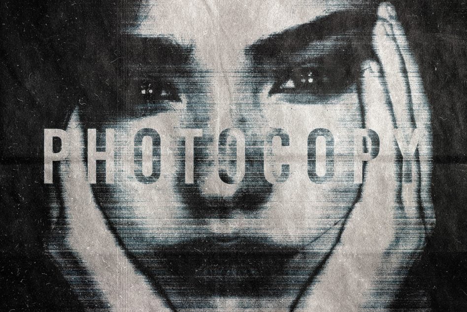 Glitchy black white photo with "PHOTO UP" text overlay, scratchy VHS scan lines, grungy distressed film grain texture